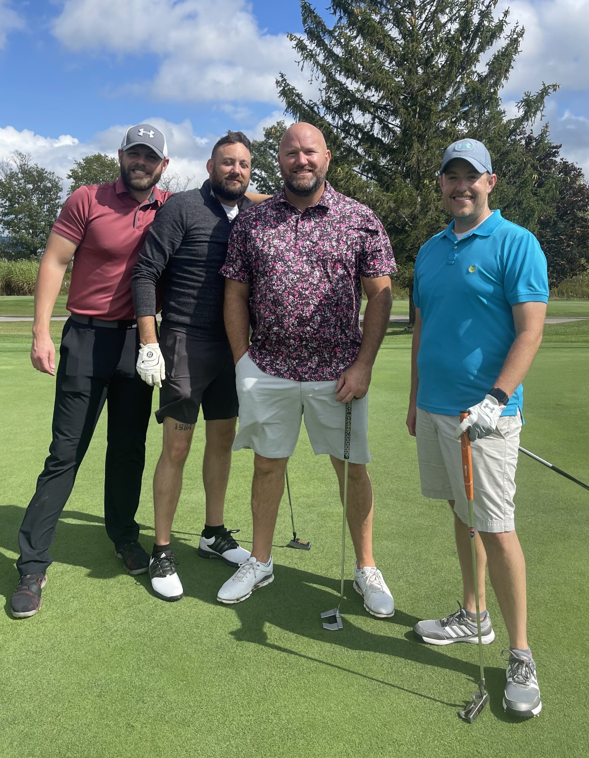 Golfers pose at the Golf Club of Indiana